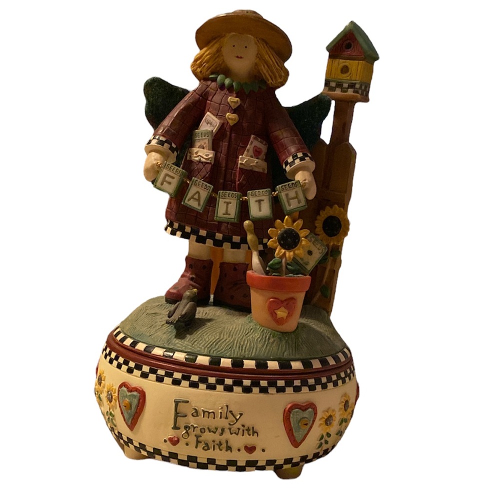 Guardians of the Hesrt music box by Debbie Mumm.  Music box works.